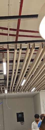 Acoustical baffle ceiling post image