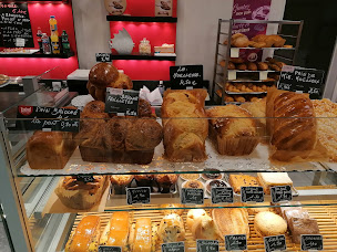 Photo n°39 de Boulangerie pâtisserie Gilbert Christophe et Patricia à Rouillon (Boulangerie)