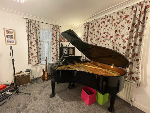 Piano Lessons For ALL Music School
