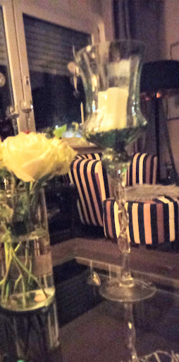 Blumen- und Geschenkdeele Inh. M. Dahmen Logo