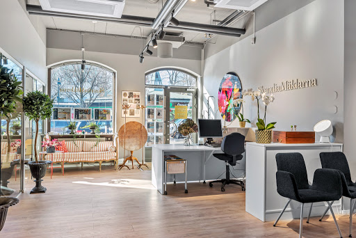 Martin & Almström Fastighets AB Skandia Mäklarna Danderyd Logo