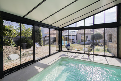 Photo de AKENA véranda, extension de maison, pergola bioclimatique, carport et pool house à Saint Brieuc à Plédran (22960)