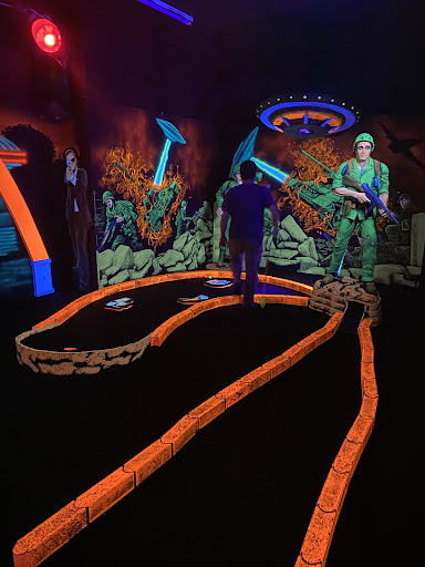 Mothman Blacklight Mini-Golf Logo