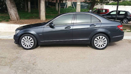 Taxi Service - Χ. Μπάζος