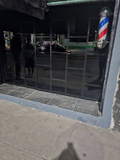Los De La M. BARBER SHOP