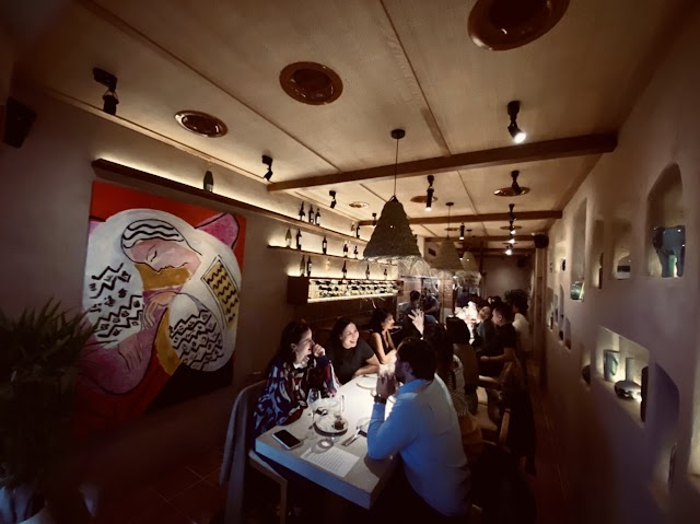 Etēsia • kitchen counter + wines