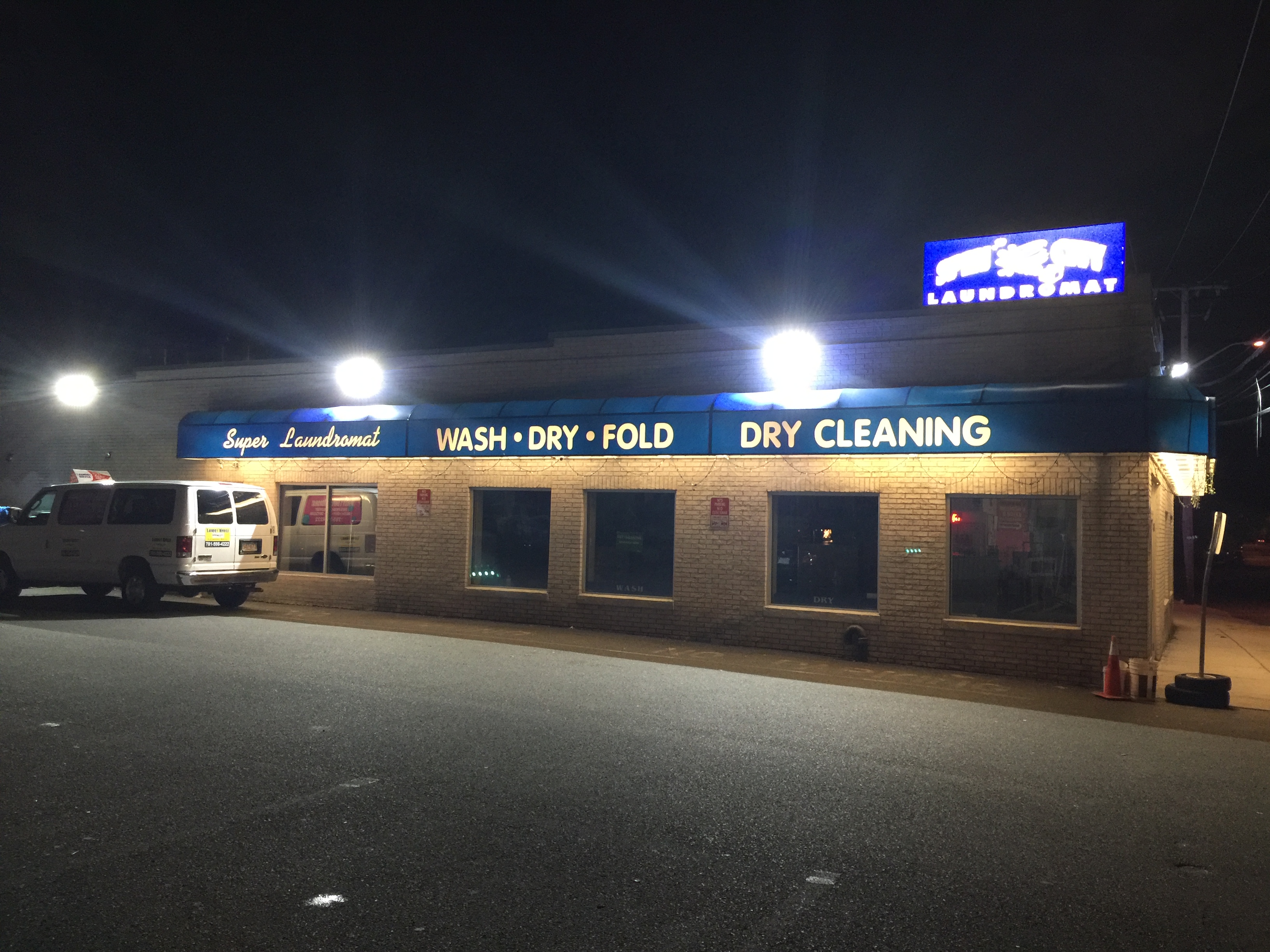 Clean laundry equipment at Spin City Super Laundromat in Lynn, MA