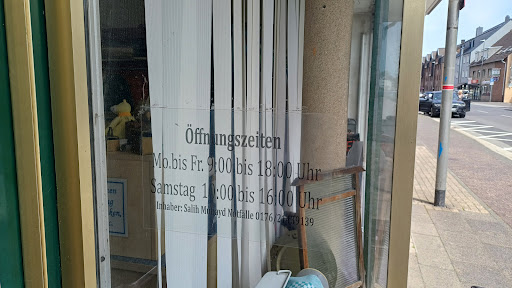 City,Wäscherei,Heißmangel&Bügelservice Logo