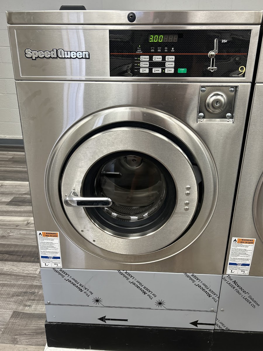 So Fresh So Clean Laundromat storefront and entrance in Denver