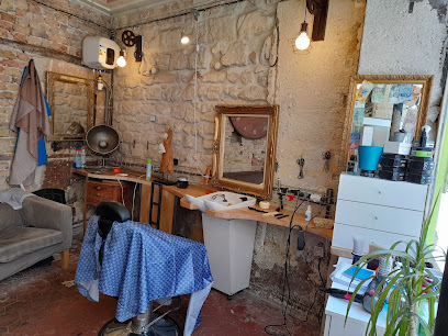 Barbier coiffeur la main d'or