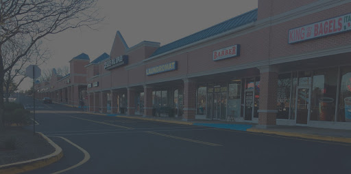 Howell Plaza Shopping Center Logo