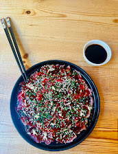 Sashimi de Buey Con Salsa Sake Y Soja