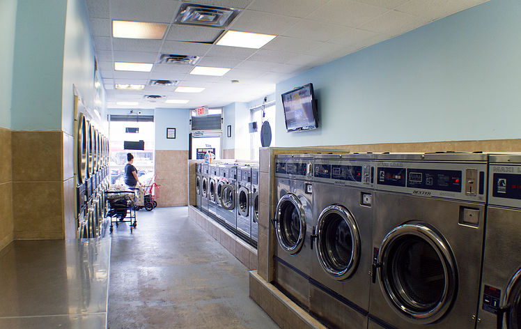 Clean laundry equipment at Senor Bubbles Laundromat in Jersey City, NJ