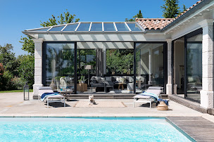 Photo n°11 de Vie & Véranda à Rots (Constructeur de kiosques/pavillons de jardin)