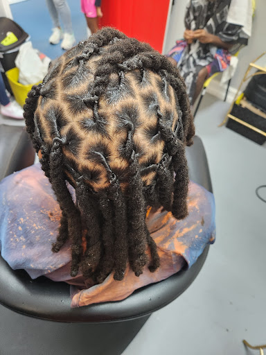 Mahogany's Beauty and Dreadlocks located at Expose Hair Loft Gallery - United States