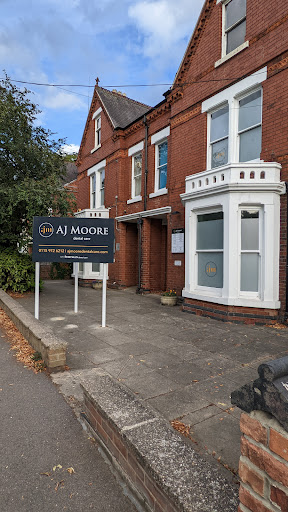 AJ Moore & Associates Logo