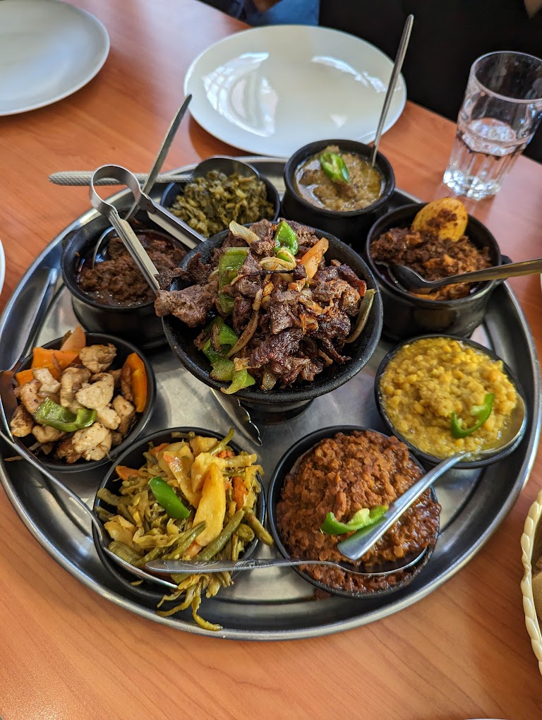 Discover the flavors of Ethiopia in London with our guide to the top Ethiopian restaurants in the city. From traditional stews to vegan options, we've got you covered for a delicious dining experience. #londonfoodguide #londonrestaurants | Places To Eat In London | Ethiopian Restaurants In London | African Restauarants In London | London Food Scene | Unique Places To Eat In London | Quirky Places To Eat In London #london #brixton #camberwell #camden #kentishtown #finsburypark #northlondon