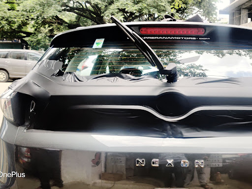Wrapped TATA NEXON white panal To black vinyl post image
