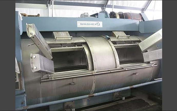 A+ Laundry Service Inc facility with washing machines in Lawrence