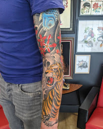 Photo n°24 de L´Ogre Rouge à Pont-Péan (Tatoueur)