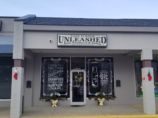 Tony Turner Unleashed Hair Products/ Unleashed The Salon Logo