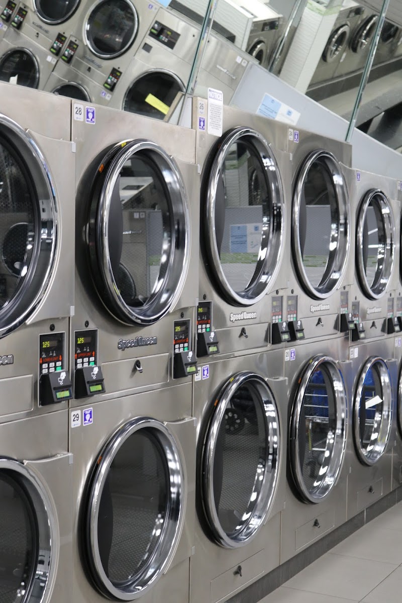Clean laundry equipment at Spins Laundromat Jersey City in Jersey City, NJ