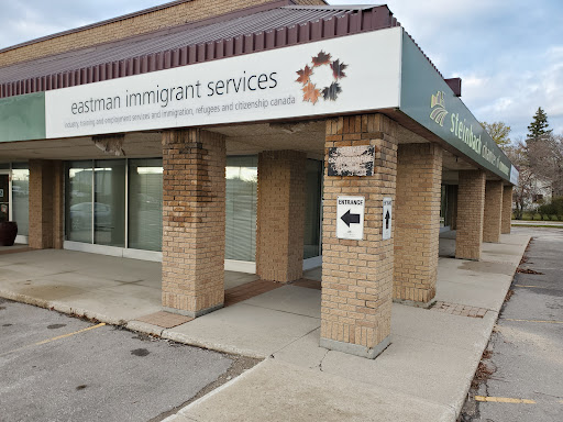 Eastman Immigrant Services Logo
