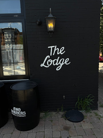 The Lodge by Two Robbers by null