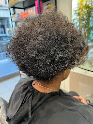 Photo n°14 de ROLAND MARTINIE à Saint-Denis (Salon de coiffure)