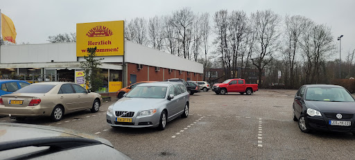 Parkplatz bei Zimmermann Sonderposten - Mehr als Du denkst! Logo
