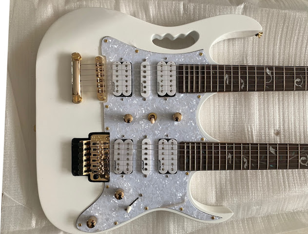 The Top Guitars Company LLC by null