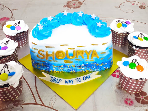 6 month birthday theme cake  post image