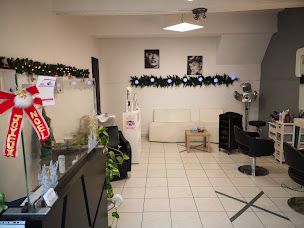 Photo n°2 de A'rt Coiffure à Cuxac-d'Aude (Salon de coiffure)