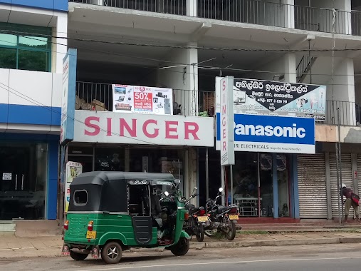 Singer AD Shop, Author: Wa Vi