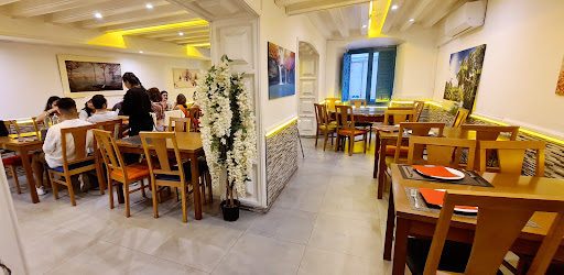 Unik Asiatico Restaurante Logo