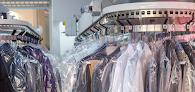 Esquire Dry Cleaners logo