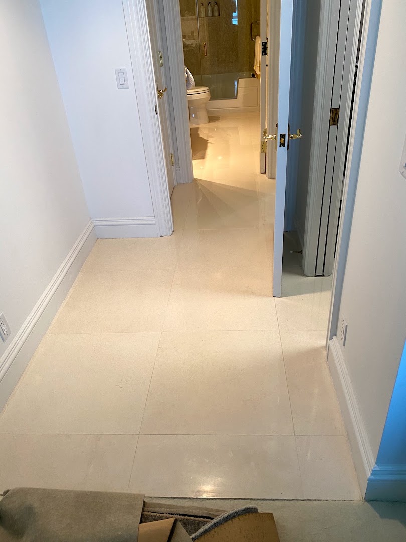 Marble countertop edge polishing and chip repair in an Aventura kitchen — Stone Pros stone restoration in Aventura