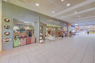 Photo n°12 de Centre Commercial Carrefour Flers Les Groseillers à Saint-Georges-des-Groseillers (Boutique de cigarettes électroniques)