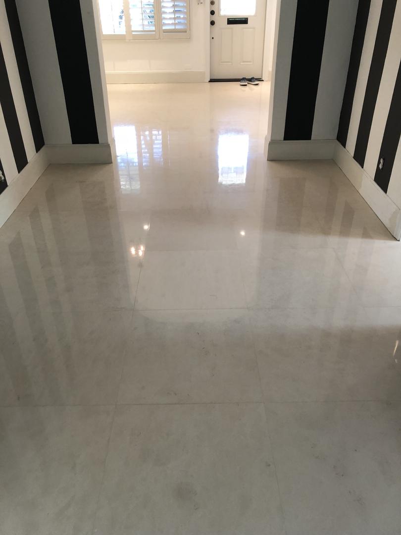 Terrazzo floor grinding and polishing in a Fort Lauderdale commercial lobby — Stone Pros stone restoration in Fort Lauderdale