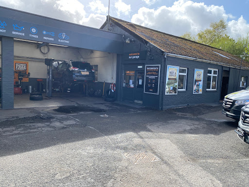 Halfords McConechys Dumfries Autocentre Logo