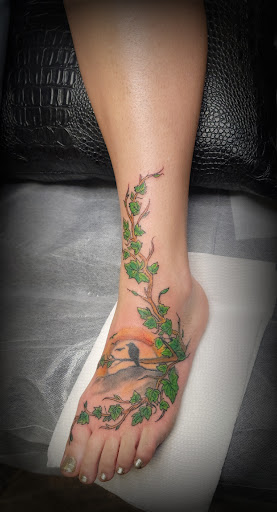 Seven Ink Tattoos And Piercings