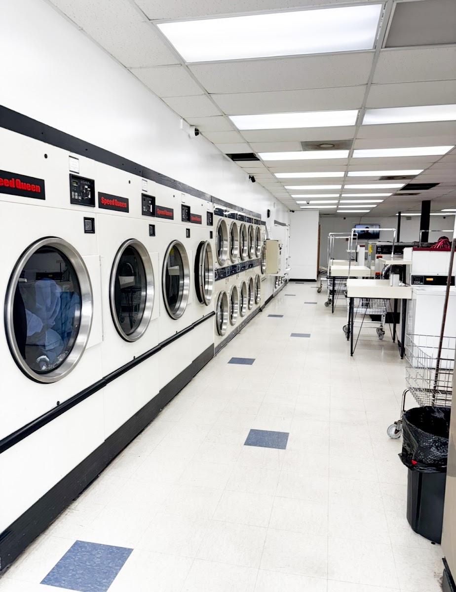 Laundry Center West facility with washing machines in Green Bay