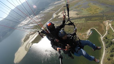 Photos of mountain hawk paragliding