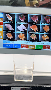 Kura Revolving Sushi Bar by null