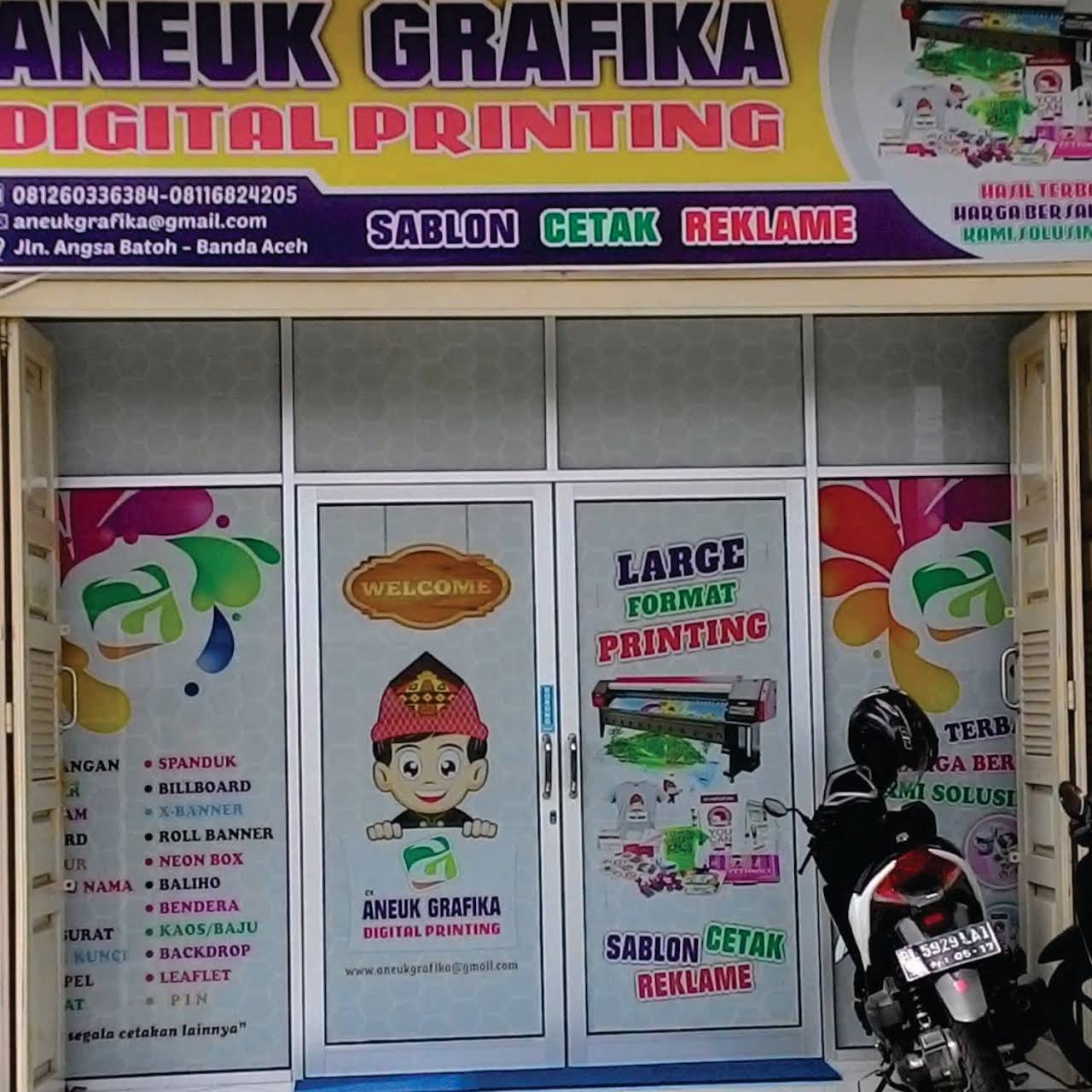 X Banner Toko Baju gambar spanduk
