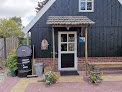photo de Vakantie huisje/bed en breakfast T'Hoonderhok en De Bongerd à Corle