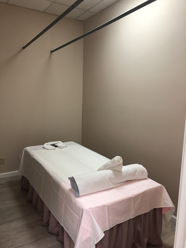 orange massage spa Logo