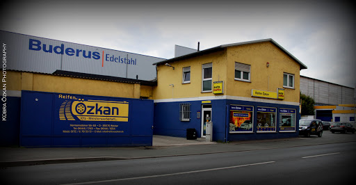 Ozkan tires, car repair services Logo
