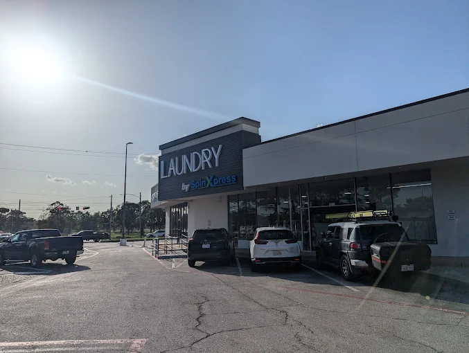 Laundry by SpinXpress - Jester Village facility with washing machines in Houston