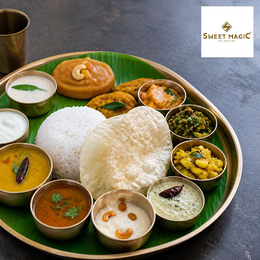 Experience a wholesome Andhra-style veg thali at Sweet Magic, crafted for food lovers searching f… post image